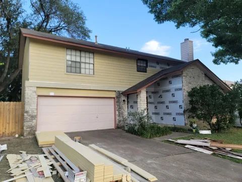 James Hardie fiber cement siding being installed on a home in Austin, Texas